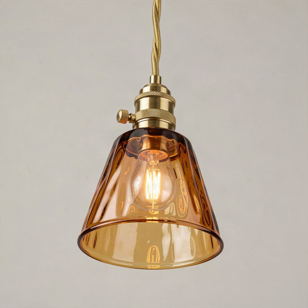 Angled view showing the open lower rim of the amber shade and the bulb inside