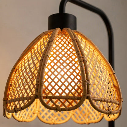 Close-up of the woven rattan petals and scalloped open-caning rim, lit from within