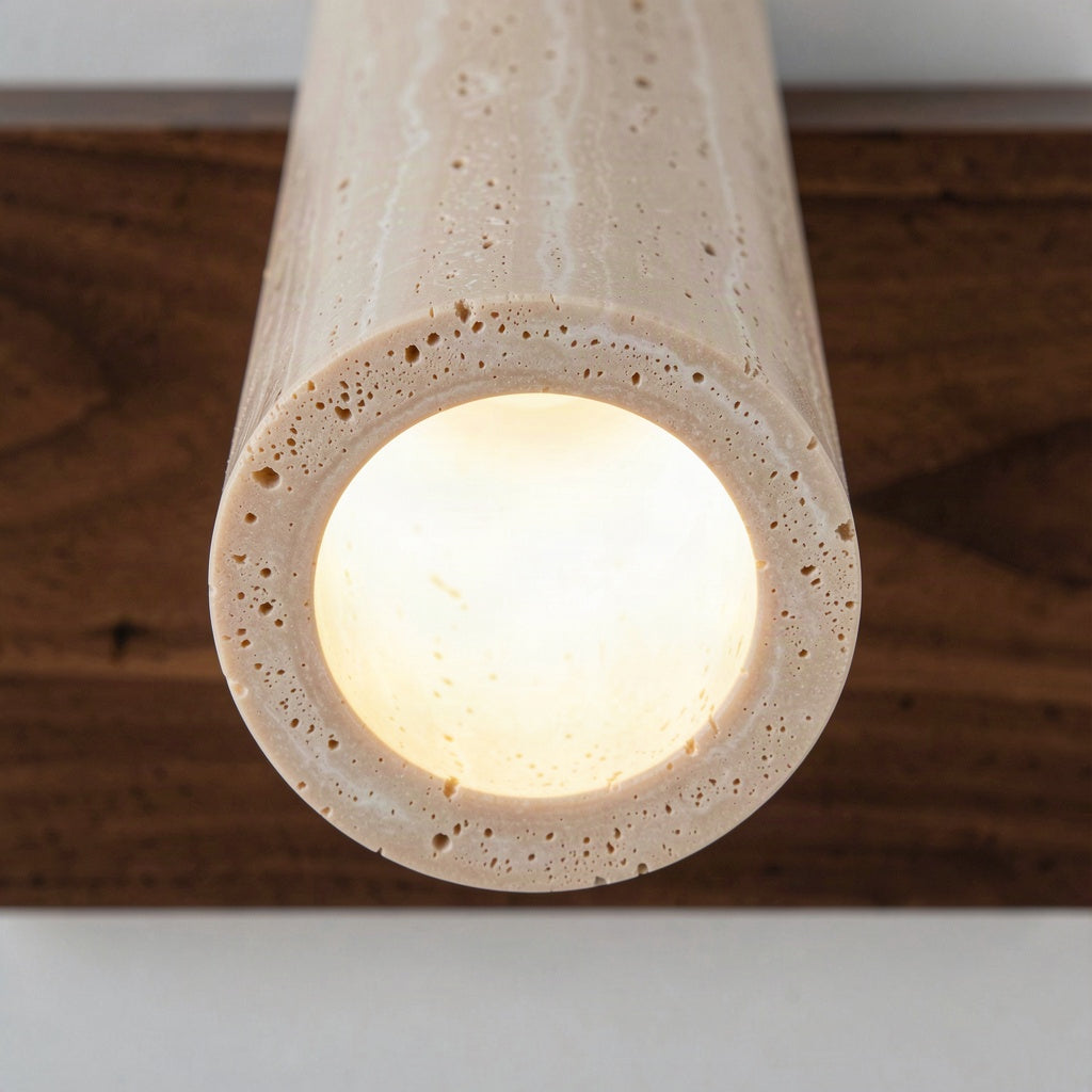 Close detail of the open end of the travertine column glowing warm