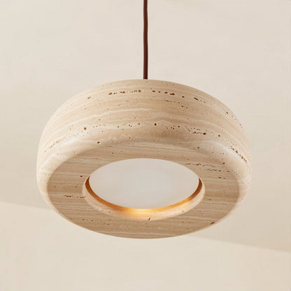 Angled view from below showing the recessed diffuser in the underside of the stone shade