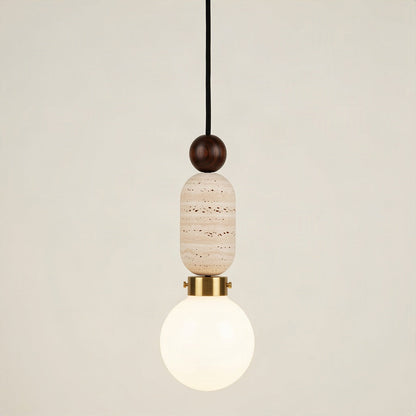Travertine pendant light with a walnut bead above the stone body and an opal glass globe below